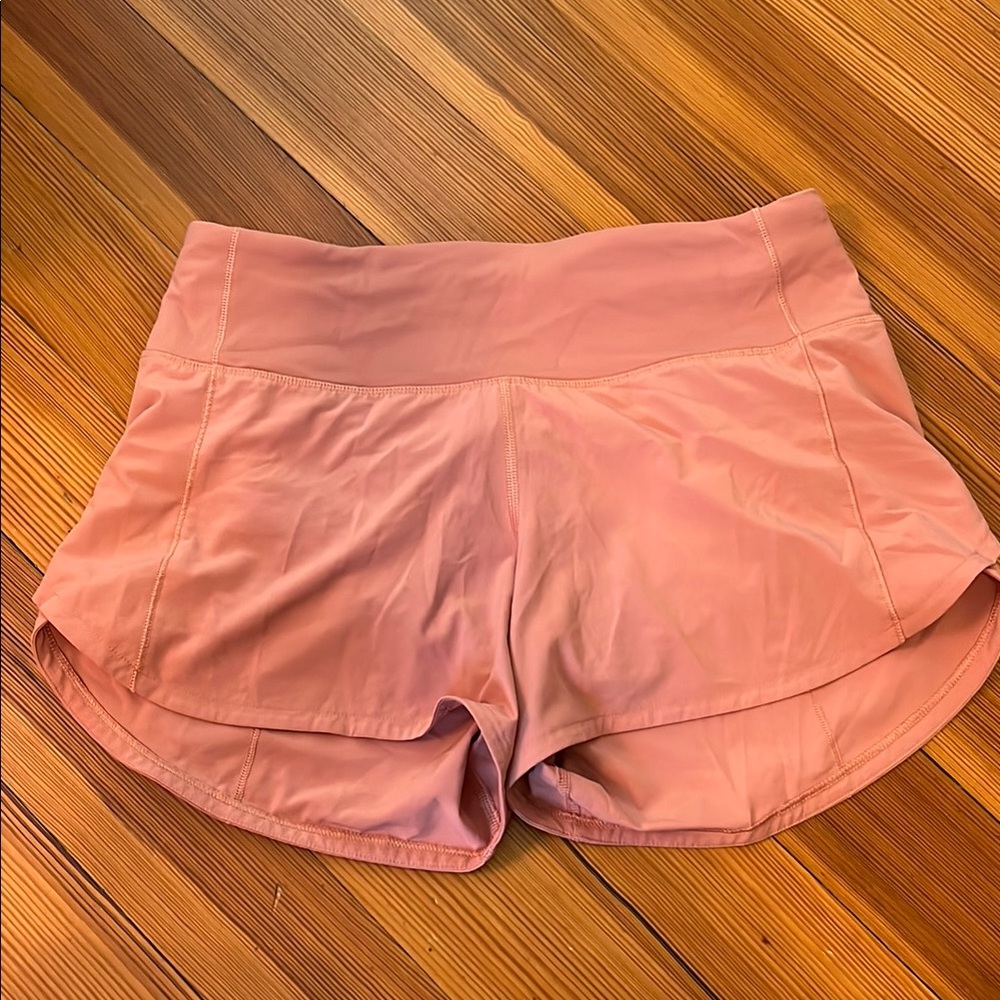 Lululemon Speed Up High-Rise Coral Pink shorts, size 4